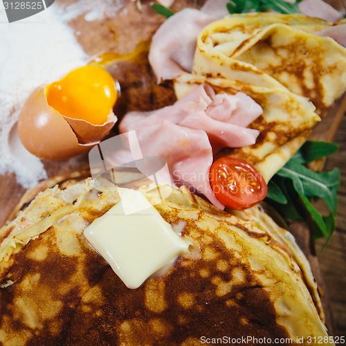 Image of pancakes with ham cheese and vegetables