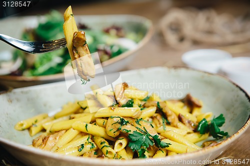 Image of pasta penne with mushrooms