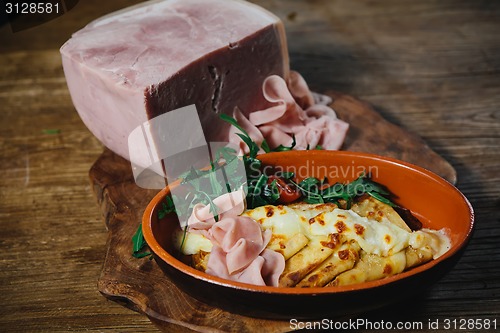 Image of pancakes with ham cheese and vegetables