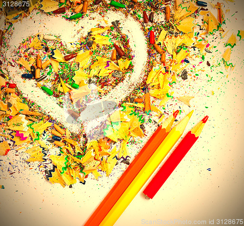 Image of heart, colored pencils and shavings