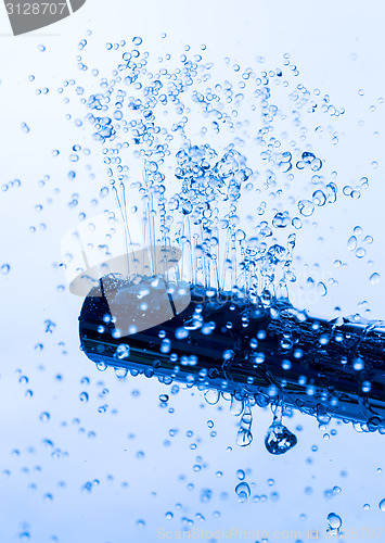 Image of Shower Head with Running Water