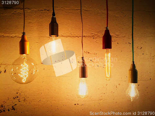 Image of Light bulbs decorating a concrete wall