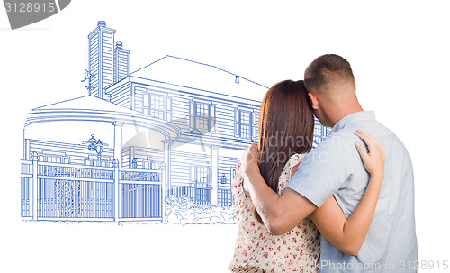 Image of Military Couple Looking At House Drawing on White