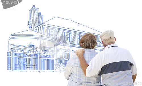 Image of Embracing Senior Couple Looking At House Drawing on White