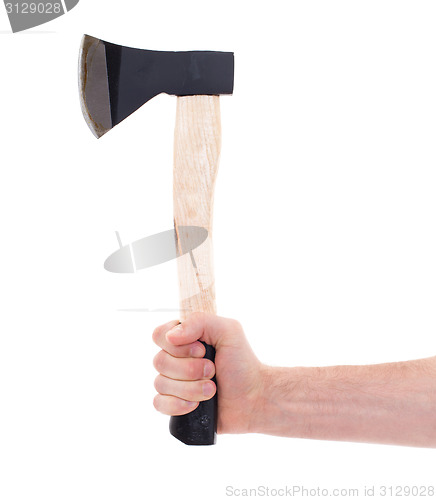 Image of Hand holding a modern axe