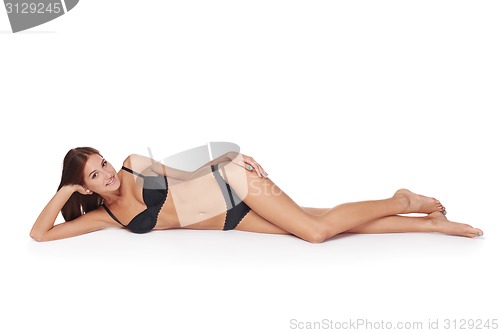 Image of Woman lying down in lingerie