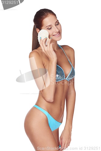 Image of Slim tanned woman in blue bikini