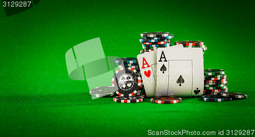 Image of chips and two aces