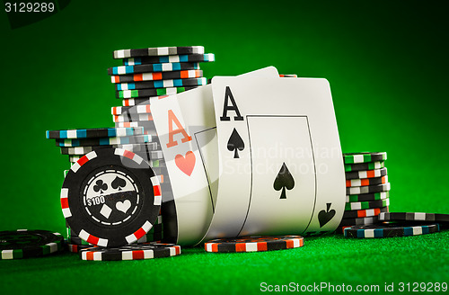 Image of chips and two aces