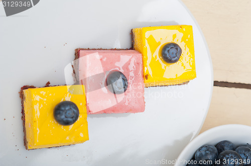 Image of strawberry and mango mousse dessert cake