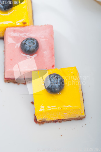 Image of strawberry and mango mousse dessert cake