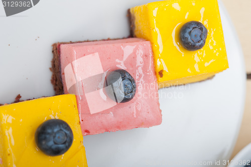 Image of strawberry and mango mousse dessert cake