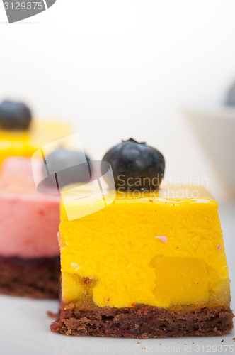 Image of strawberry and mango mousse dessert cake