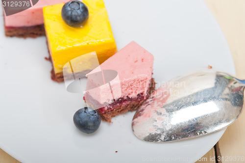 Image of strawberry and mango mousse dessert cake