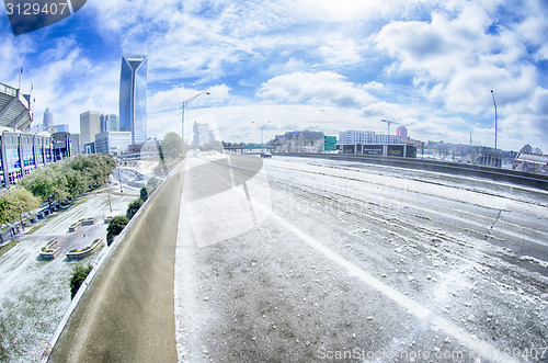 Image of snow and ice covered city and streets of charlotte nc usa