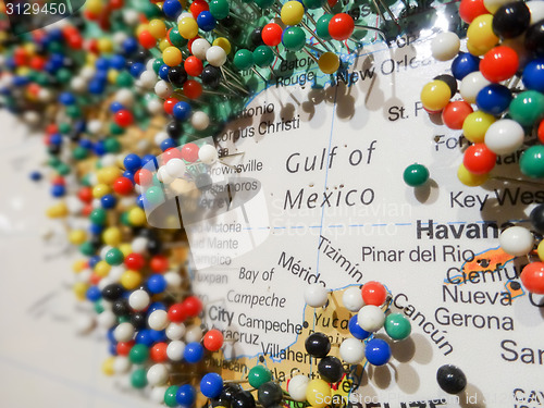 Image of many pins on a maps surrounding gulf of mexico