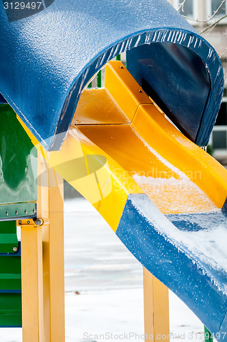 Image of snow and ice covered playground