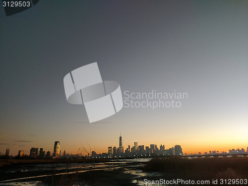 Image of Manhattan panorama at sunrise, as viewed from Jersey City across