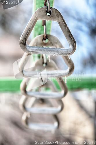 Image of snow and ice covered playground