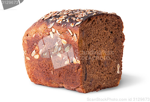 Image of Half unleavened of black bread with seeds and dried fruit