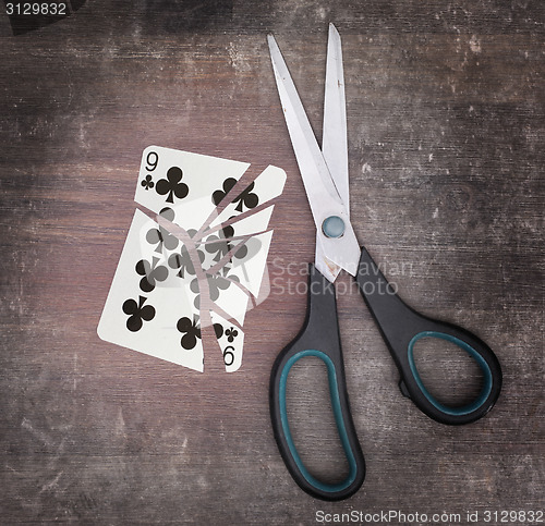 Image of Concept of addiction, card with scissors