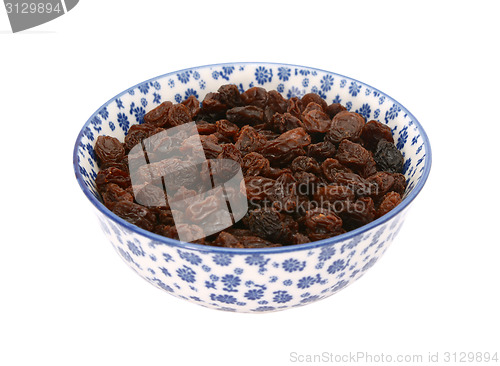 Image of Raisins in a blue and white china bowl