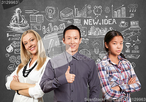 Image of Asian team and businesswoman with crossed hands