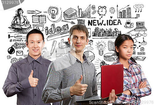 Image of Asian team and man with laptop in his hands and woman