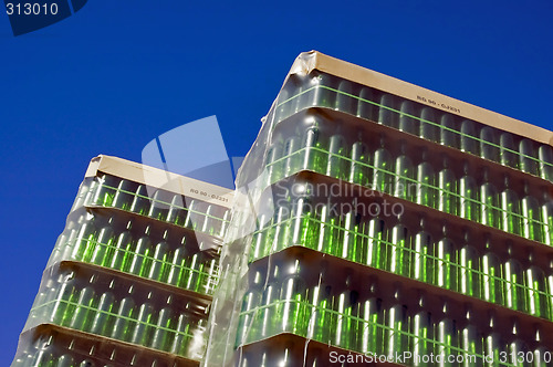 Image of Stack of green glass bottles