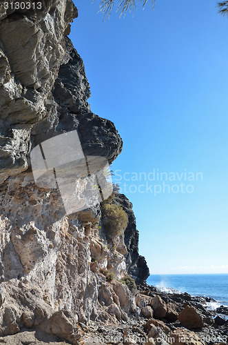 Image of Tall cliffs and rocks by the coast