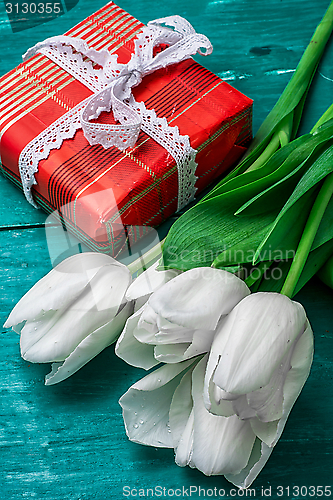 Image of gift for your favorite background tulips
