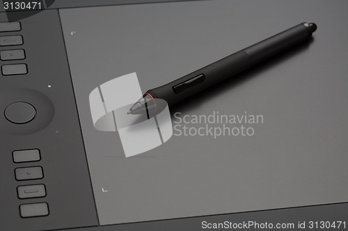 Image of Graphic tablet with digital pen.