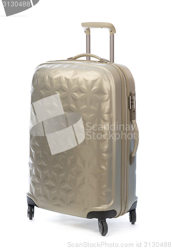 Image of Beige plastic suitcase on wheels for travel.