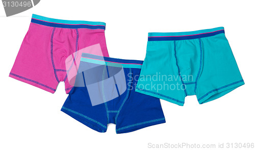 Image of Three colored men's boxer shorts.