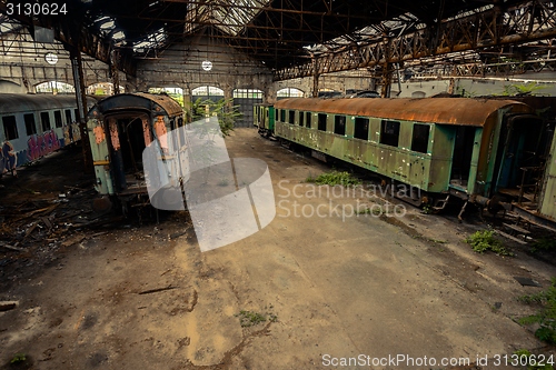 Image of Cargo trains in old train depot