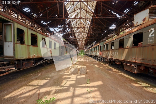 Image of Cargo trains in old train depot