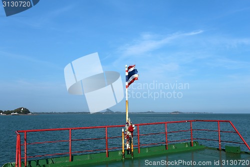 Image of Thai flag on the ferry in  sea 