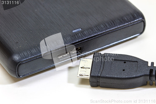 Image of External hard drive with usb cable