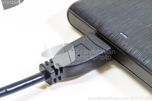 Image of External hard drive with usb cable