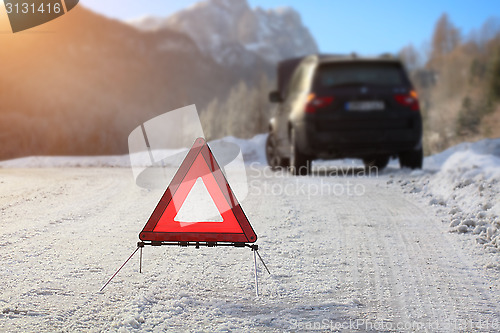 Image of Car with a breakdown in the winter