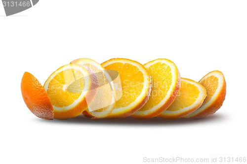 Image of Falling slices of orange on white