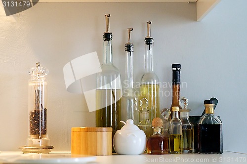 Image of oil bottles on shelf