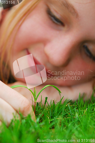 Image of Girl and seedling