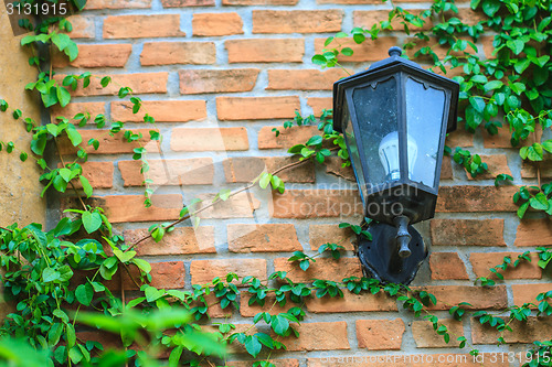 Image of old lamp on the wall 