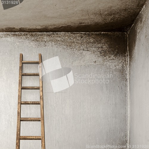 Image of stucco wall with wooden ladder