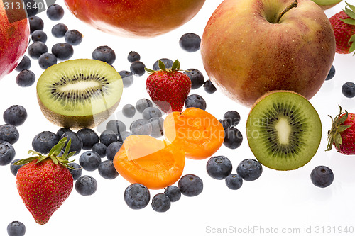 Image of Halved Apricot And Kiwi Amidst Other Fruit