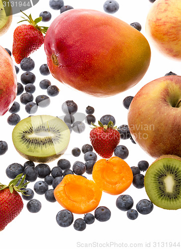 Image of Vertical Closeup Of Assorted Fruits On White