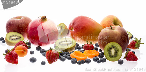 Image of Mix Of Tropical And Nontropical Fruit On White