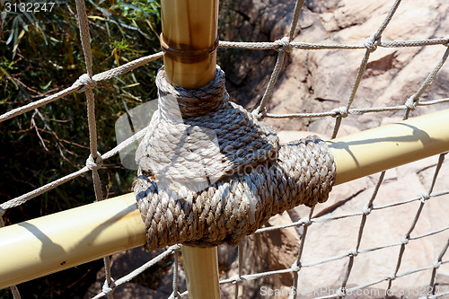 Image of detail of suspension rope bridge in Sun City South Africa