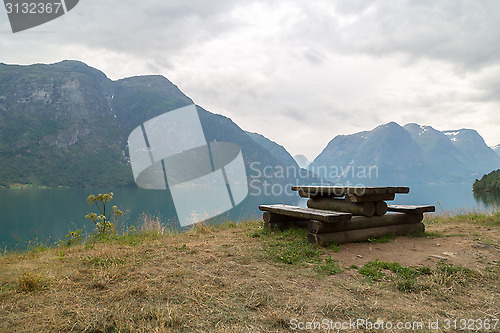 Image of Wooden bench in fjord